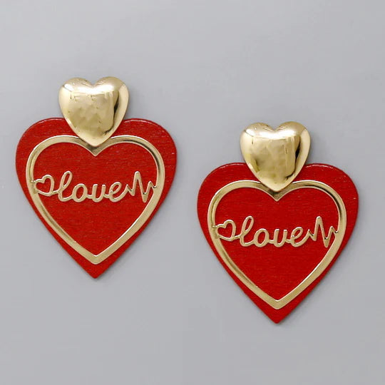 Love Wooden Heart EarringsMaterial: Lead compliant plated metal, wood Closure: Post Size: 2.35" x 1.85"